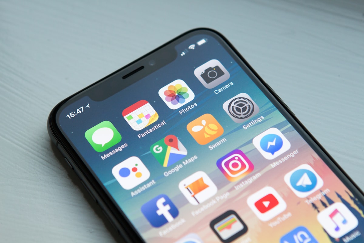 Person using mobile phone for local search with AI Overviews